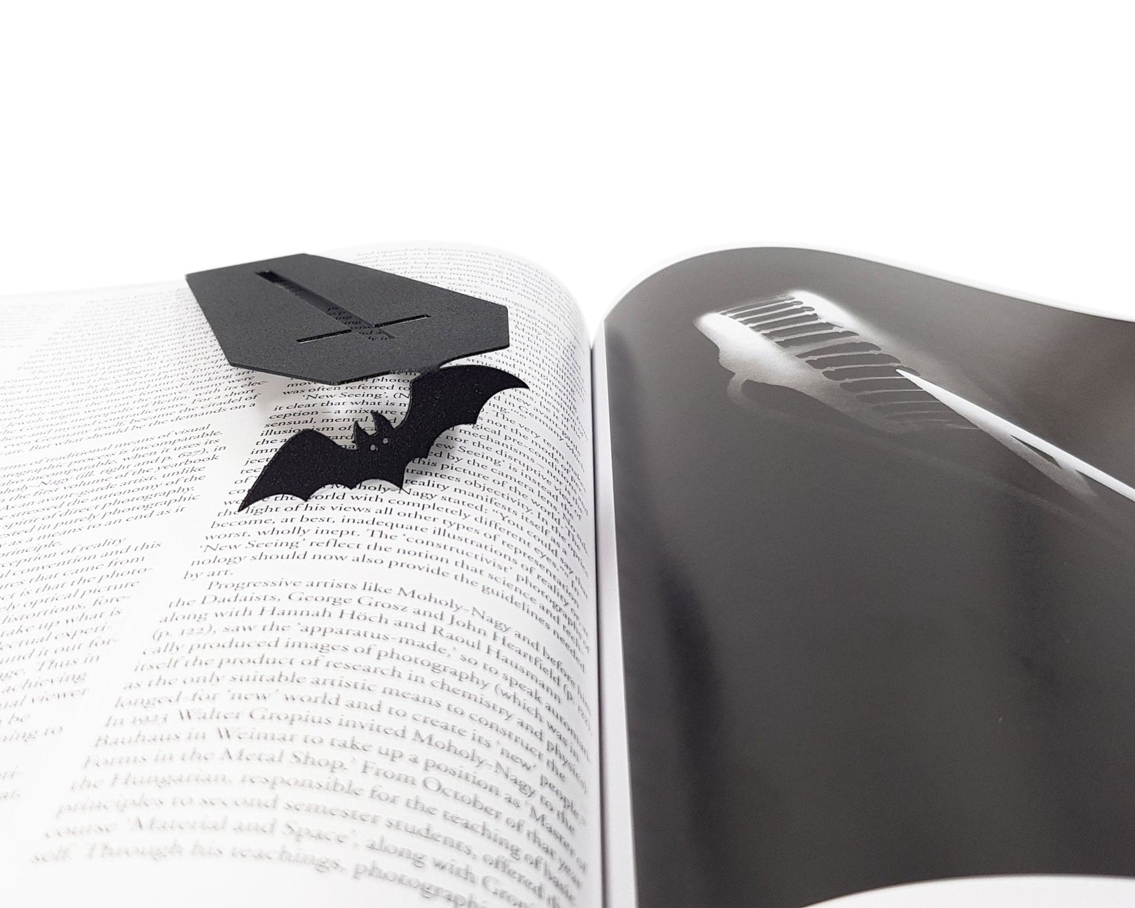 Gothic Coffin in My Book metal bookmark marking a page in an open book