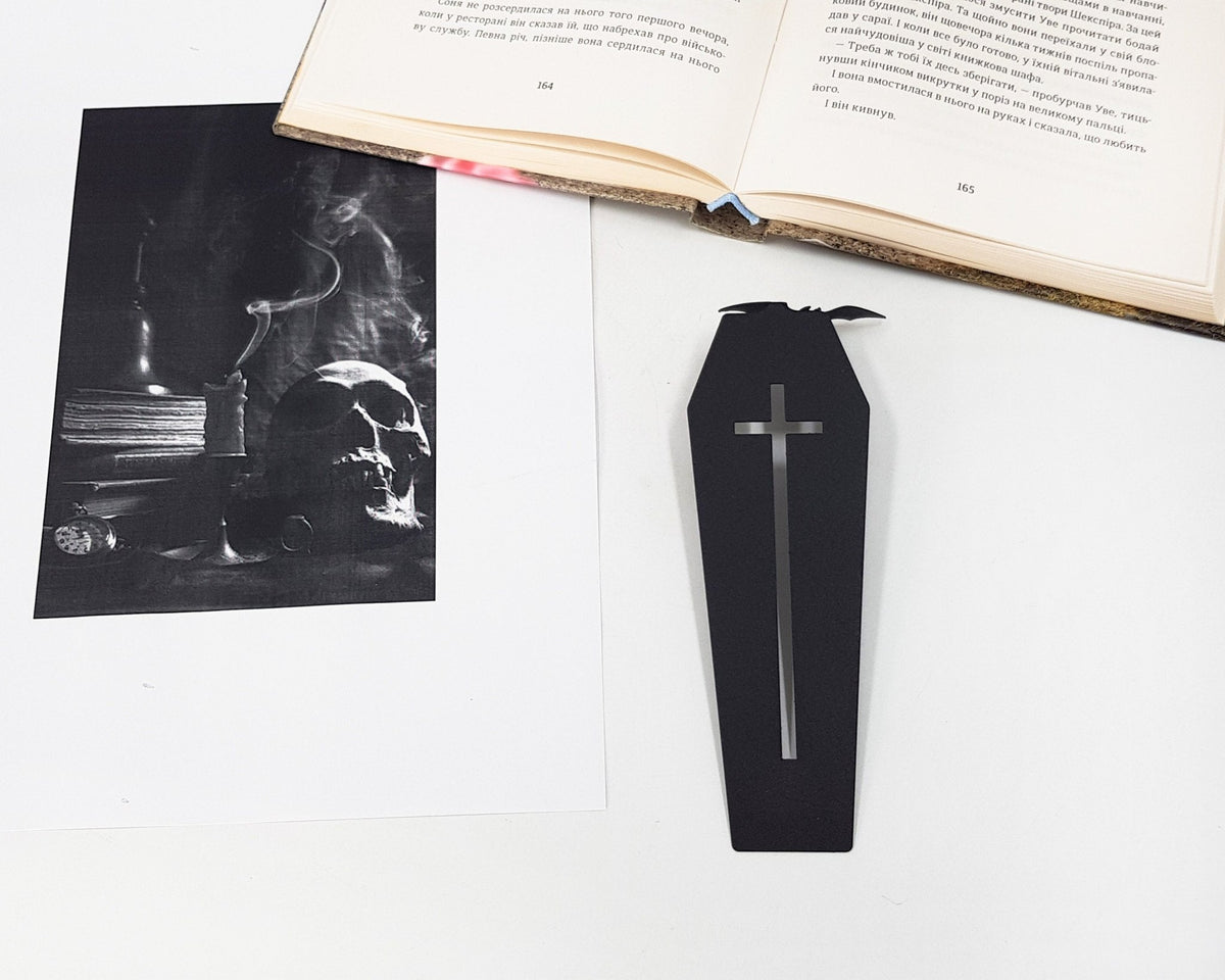 Gothic Coffin in My Book metal bookmark marking a page in an illustrated book