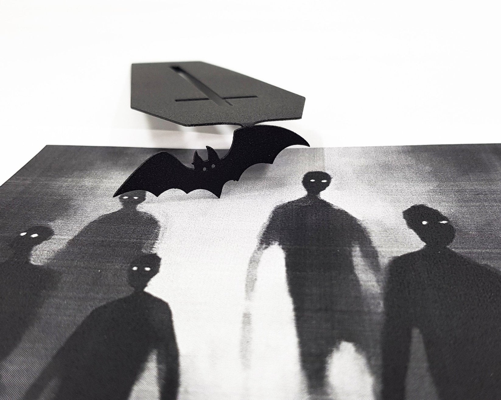 Gothic Coffin in My Book metal bookmark on an illustrated page