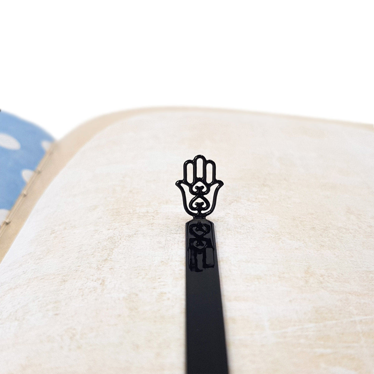 Hamsa metal bookmark close-up of the laser-cut detail