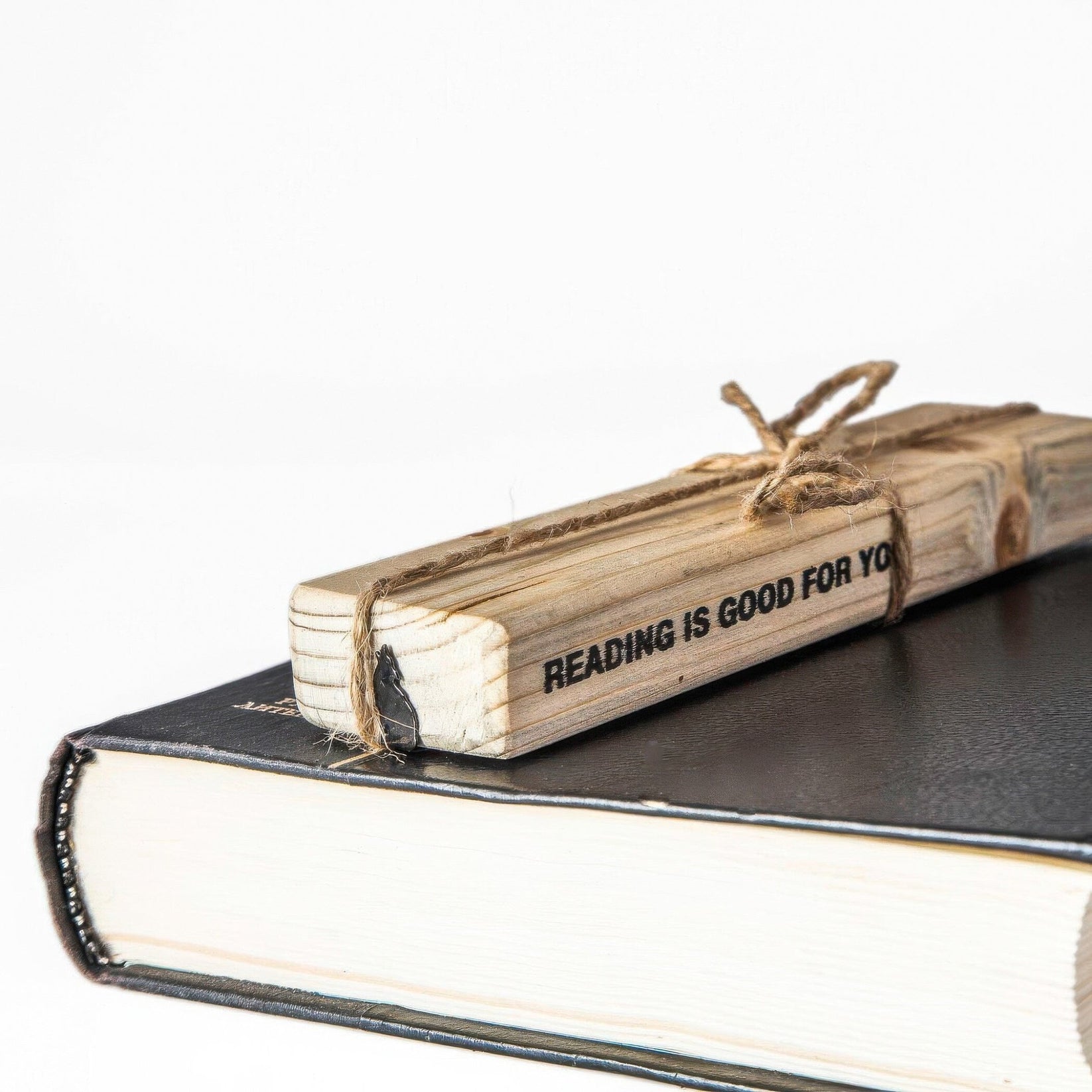 Howling Wolf metal bookmark packed with kraft paper and twine as a gift