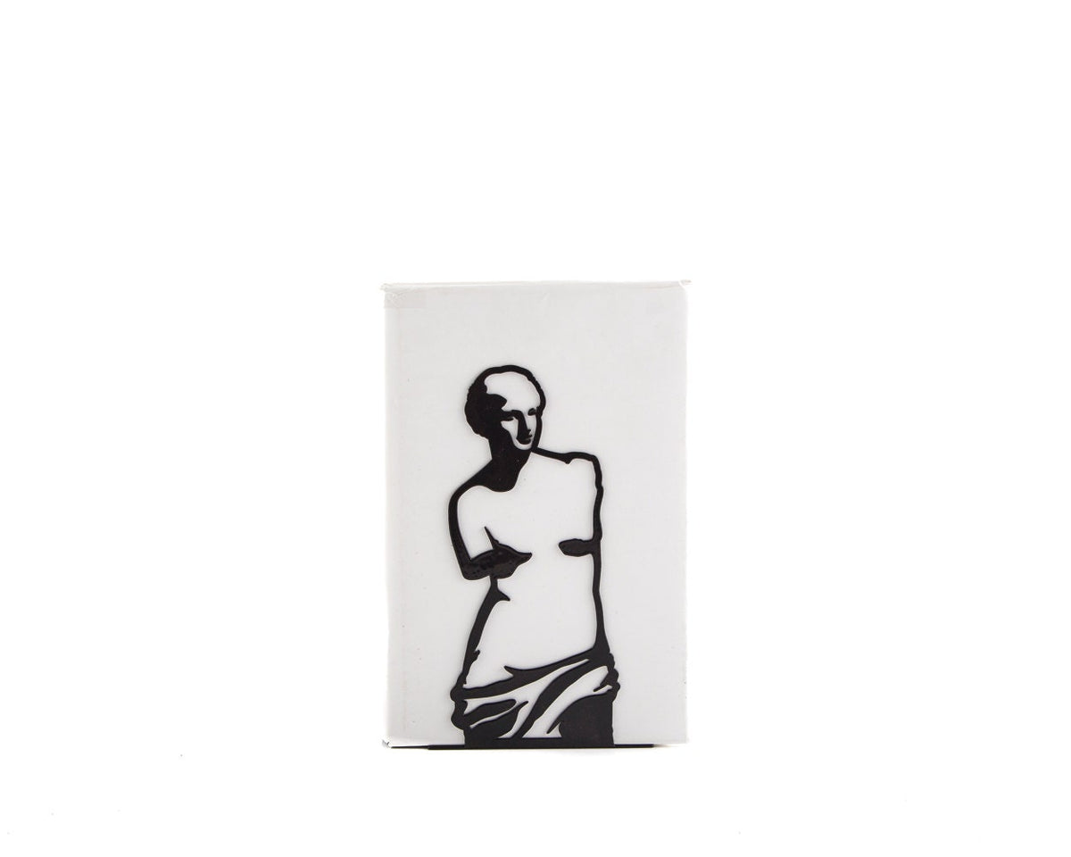 Minimalist metal bookend featuring a cutout silhouette of the Venus de Milo statue, black on white, modern and artistic design. Designed and made by Atelier Article on Etsy.
