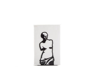 Minimalist metal bookend featuring a cutout silhouette of the Venus de Milo statue, black on white, modern and artistic design. Designed and made by Atelier Article on Etsy.
