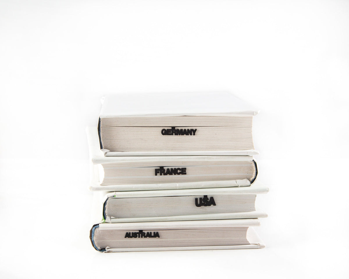 Australia metal bookmark shown with a stack of books