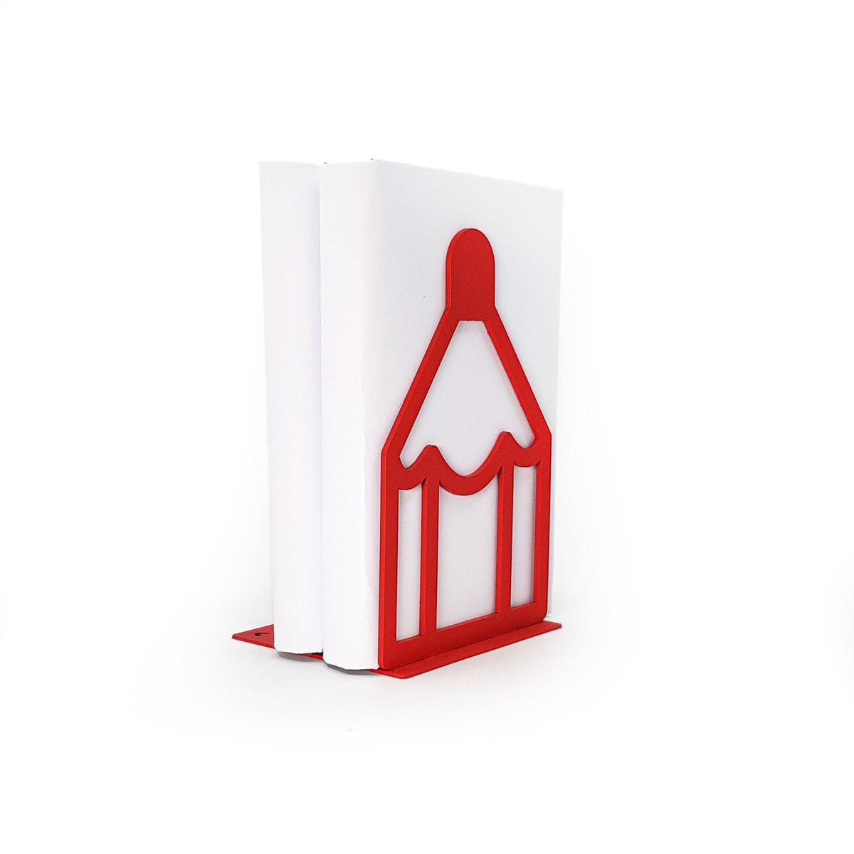 Red metal bookend in the shape of a pencil holding up two white books, shown from a side angle with a clean white background.