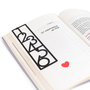 Black metal Bookmark "Numbers Bauhaus Style" in the book - Atelier Article