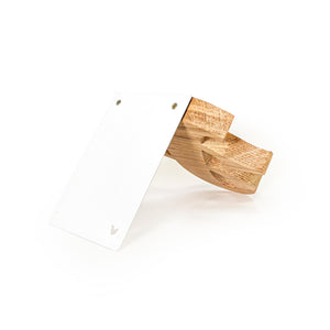 Back view of wooden ampersand bookend with angled metal support, showcasing natural wood grain and clean minimalist construction.