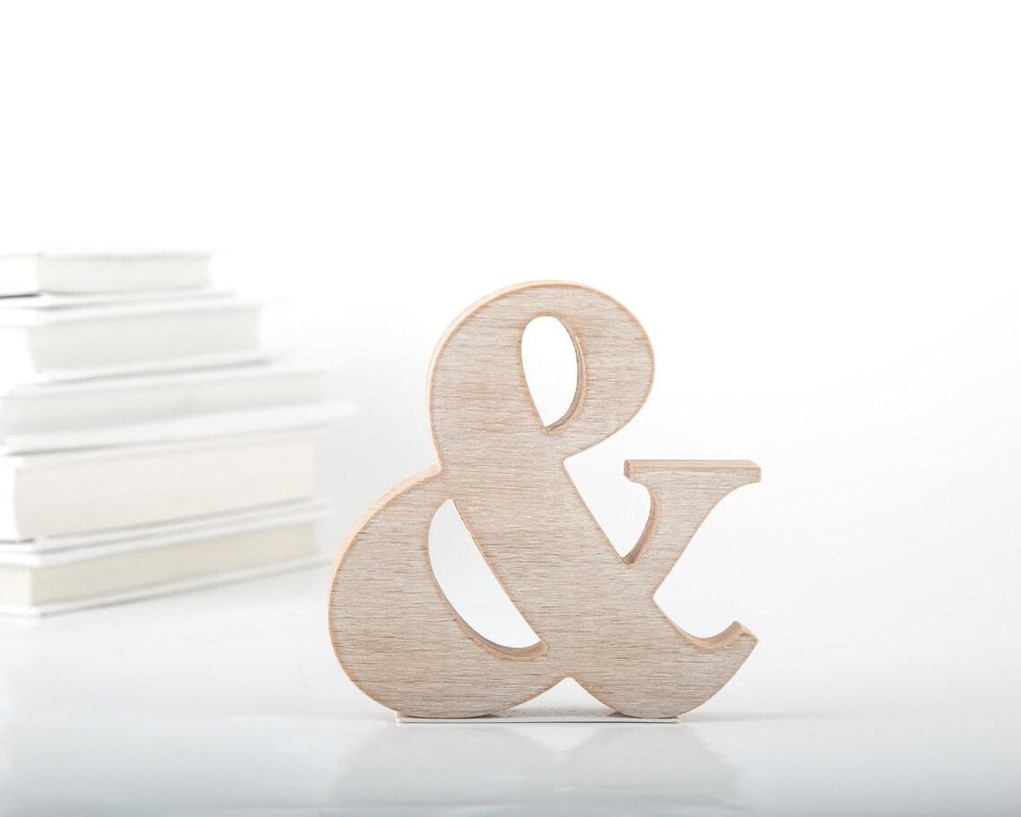 Wooden bookend ampersand by Atelier Article on Etsy.
