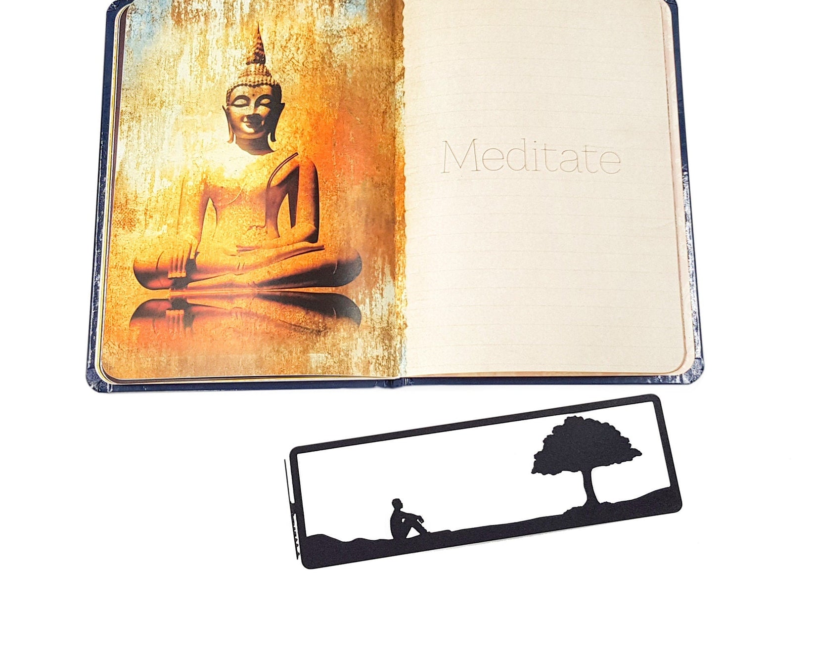 Inspirational Tranquility metal bookmark marking a page in an illustrated book
