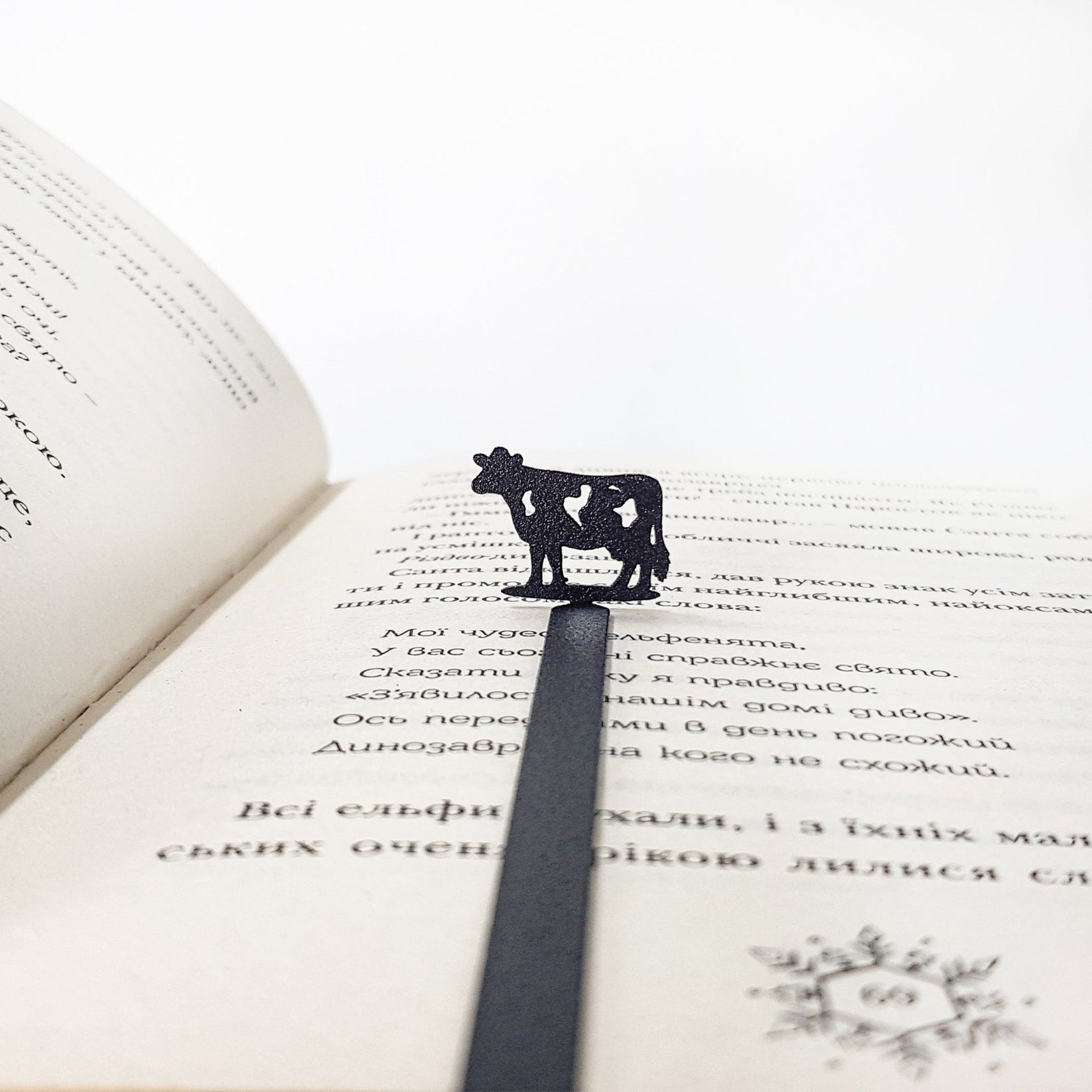 Cow bookmark gift set — metal bookmark on wooden presentation block with twine, ready to gift