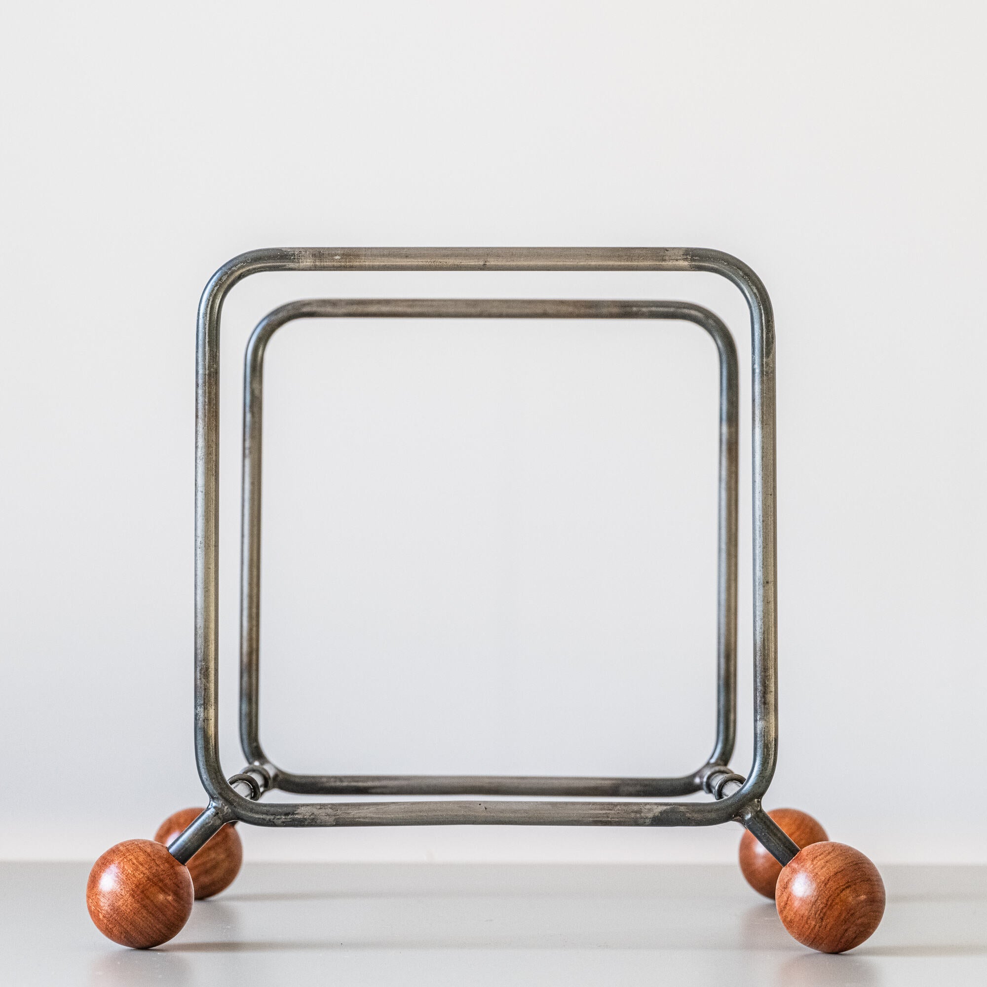 Minimalist Vinyl Record Rack with Wooden Ball Feet – Modern Metal LP Stand - Atelier Article