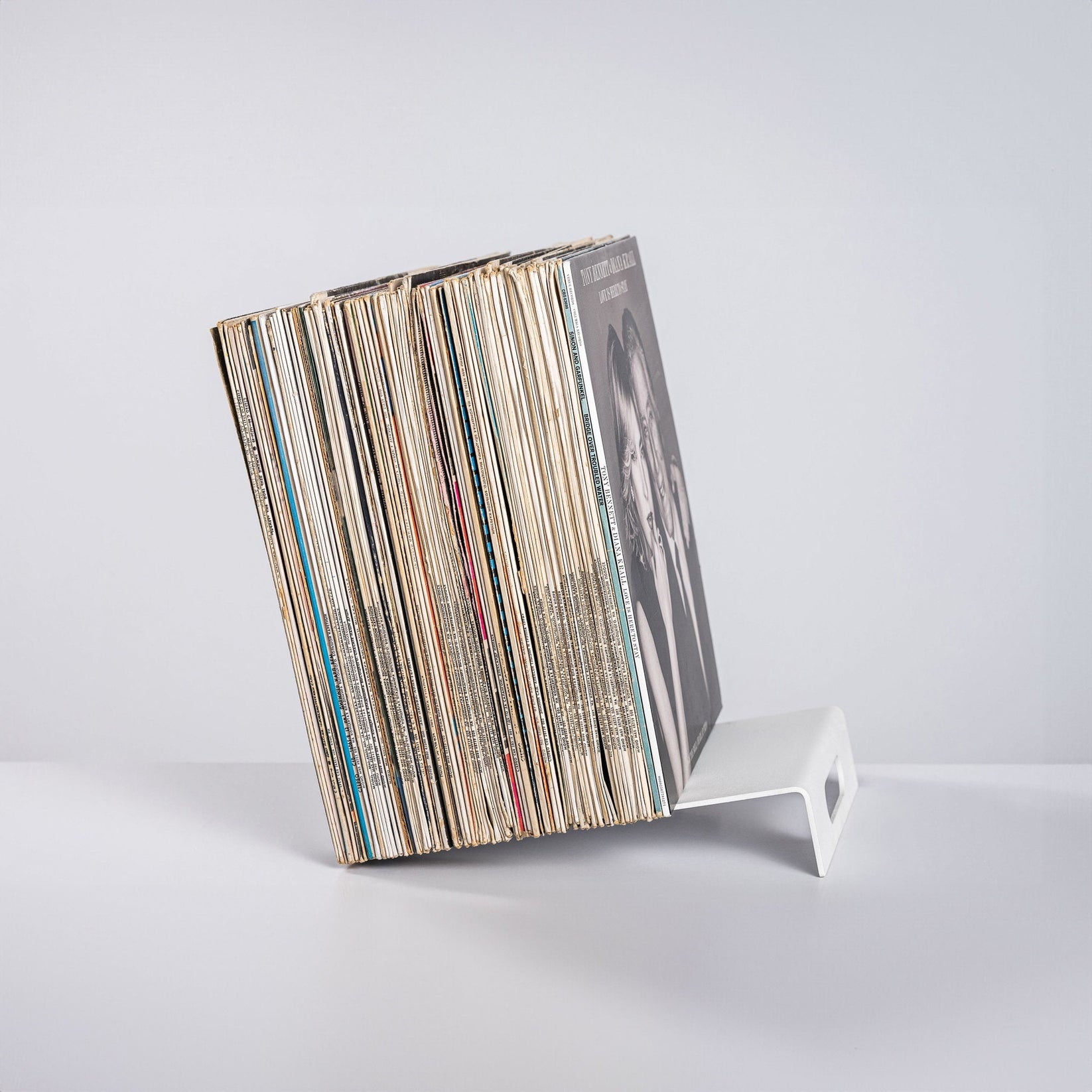 Side view of a White Metal LP Vinyl Record Display Stand. 