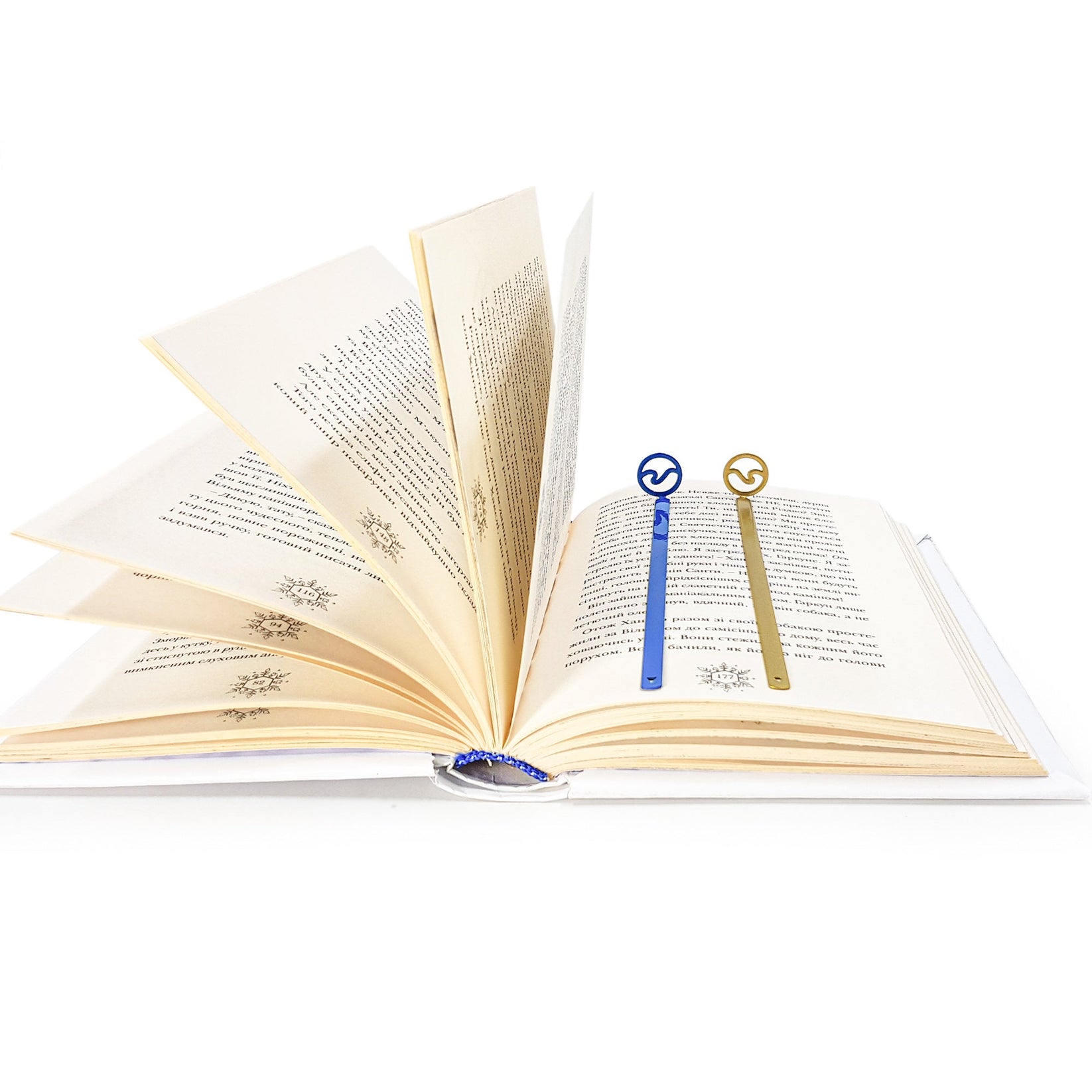 Nautical Big Wave metal bookmark shown together with other bookmarks from the range