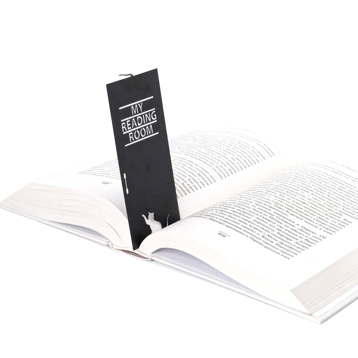 My Reading Room metal bookmark resting on the pages of an open book