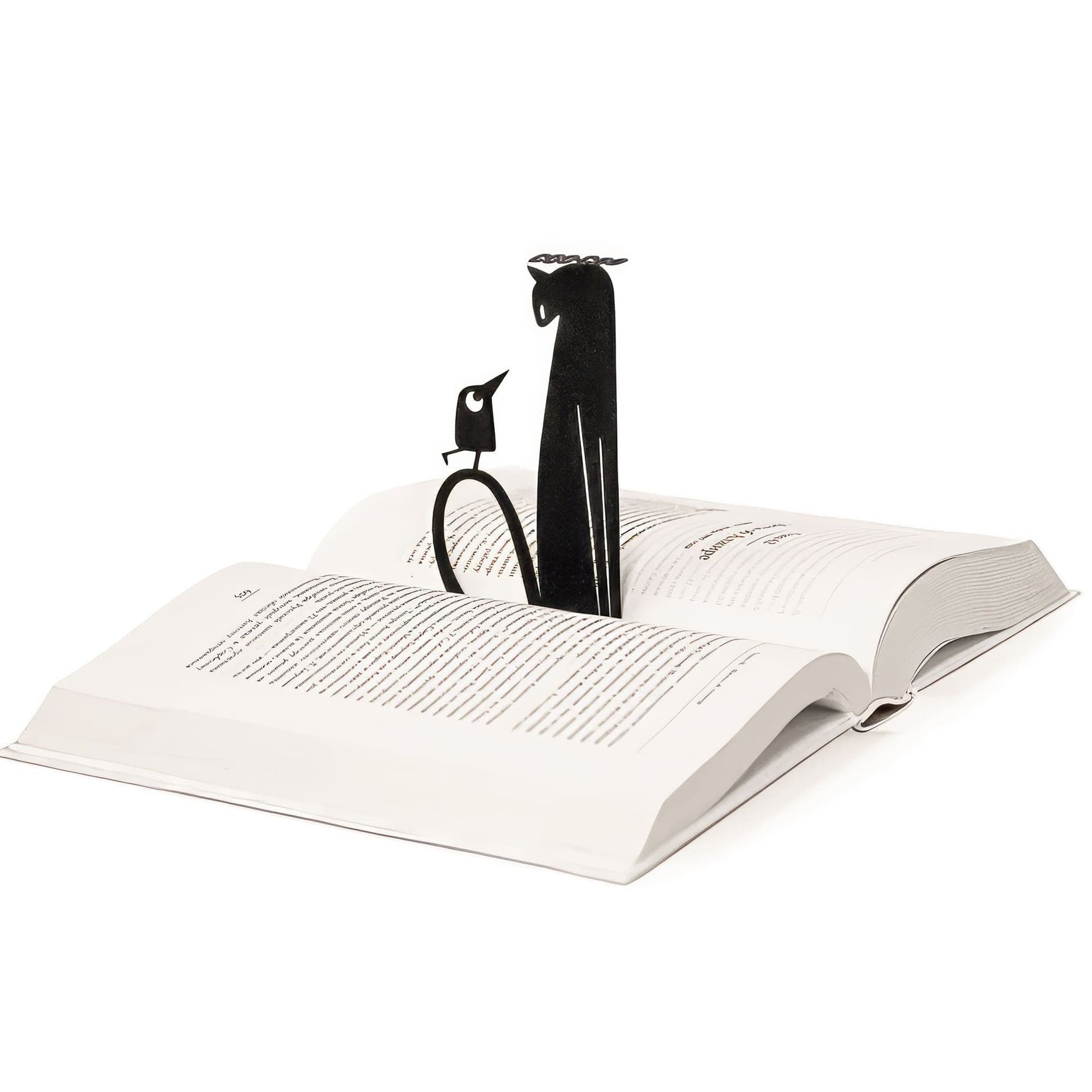 Cat and Bird Coo Coo metal bookmark resting on the pages of an open book