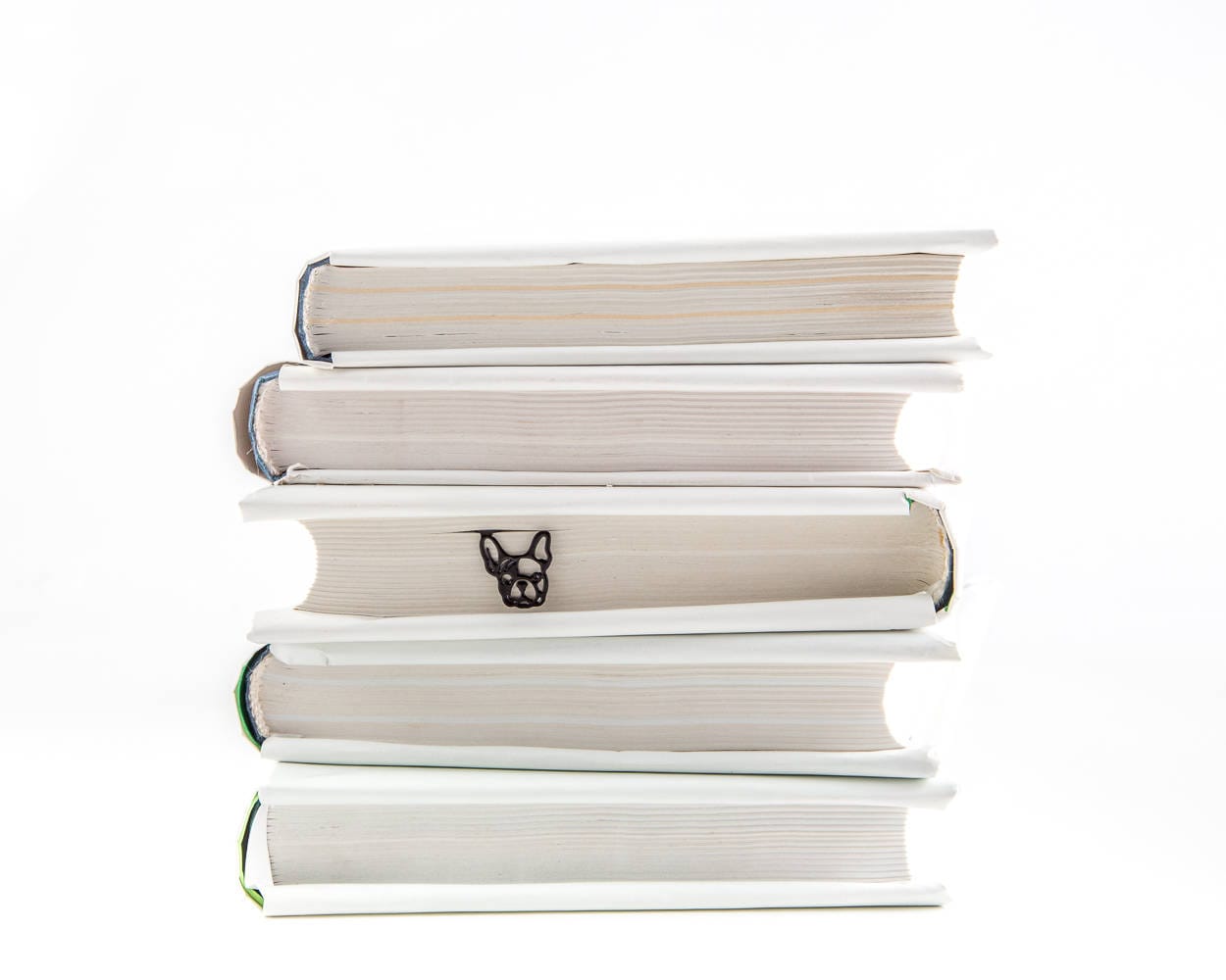 French Bulldog metal bookmark shown with a stack of books