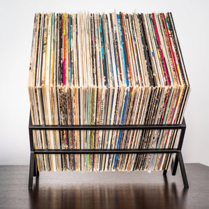 Black 1Romb vinyl record stand holding a single row of records