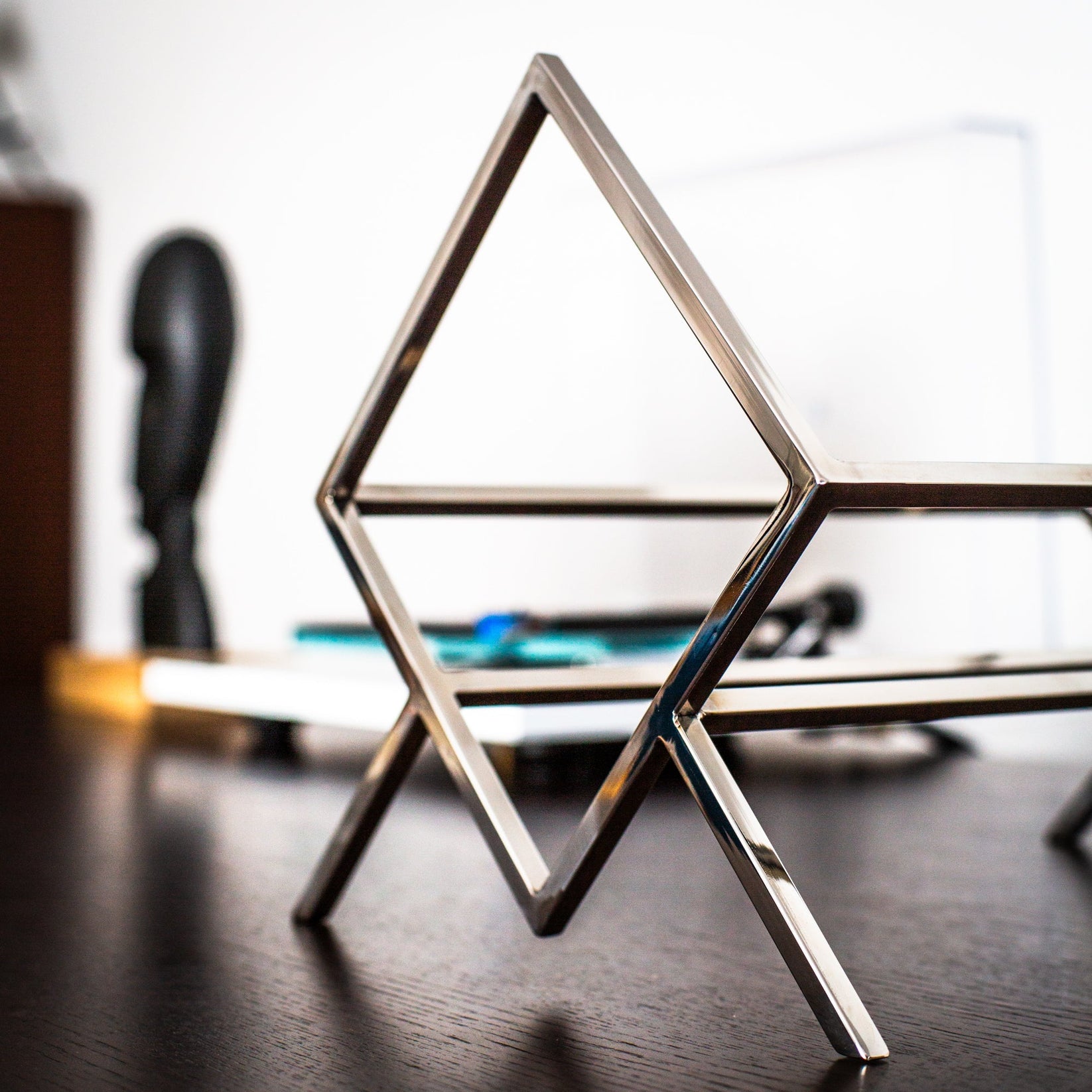 Hand-welded stainless steel frame detail on the 1Romb record stand