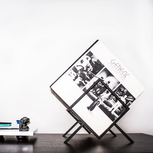 Black 1Romb record stand with an album cover visible