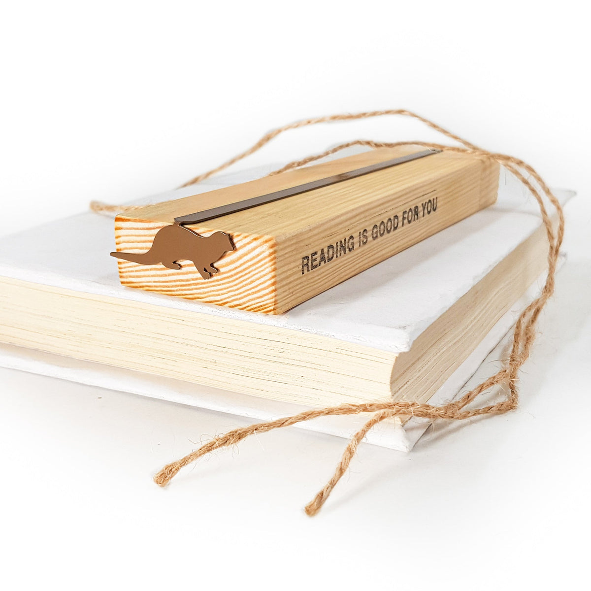 Otter bookmark with the engraved wooden gift block it ships with