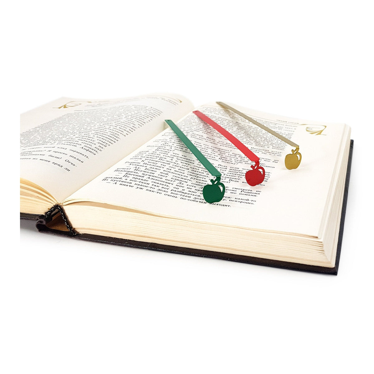 Paradise Apple' metal bookmark shown together with other bookmarks from the range