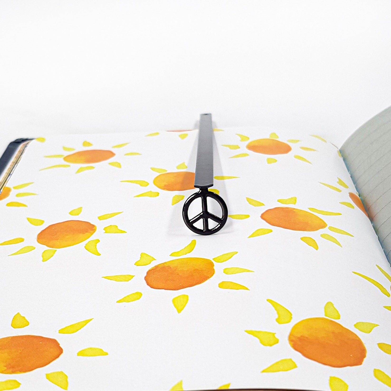 Peace metal bookmark on a coloured background
