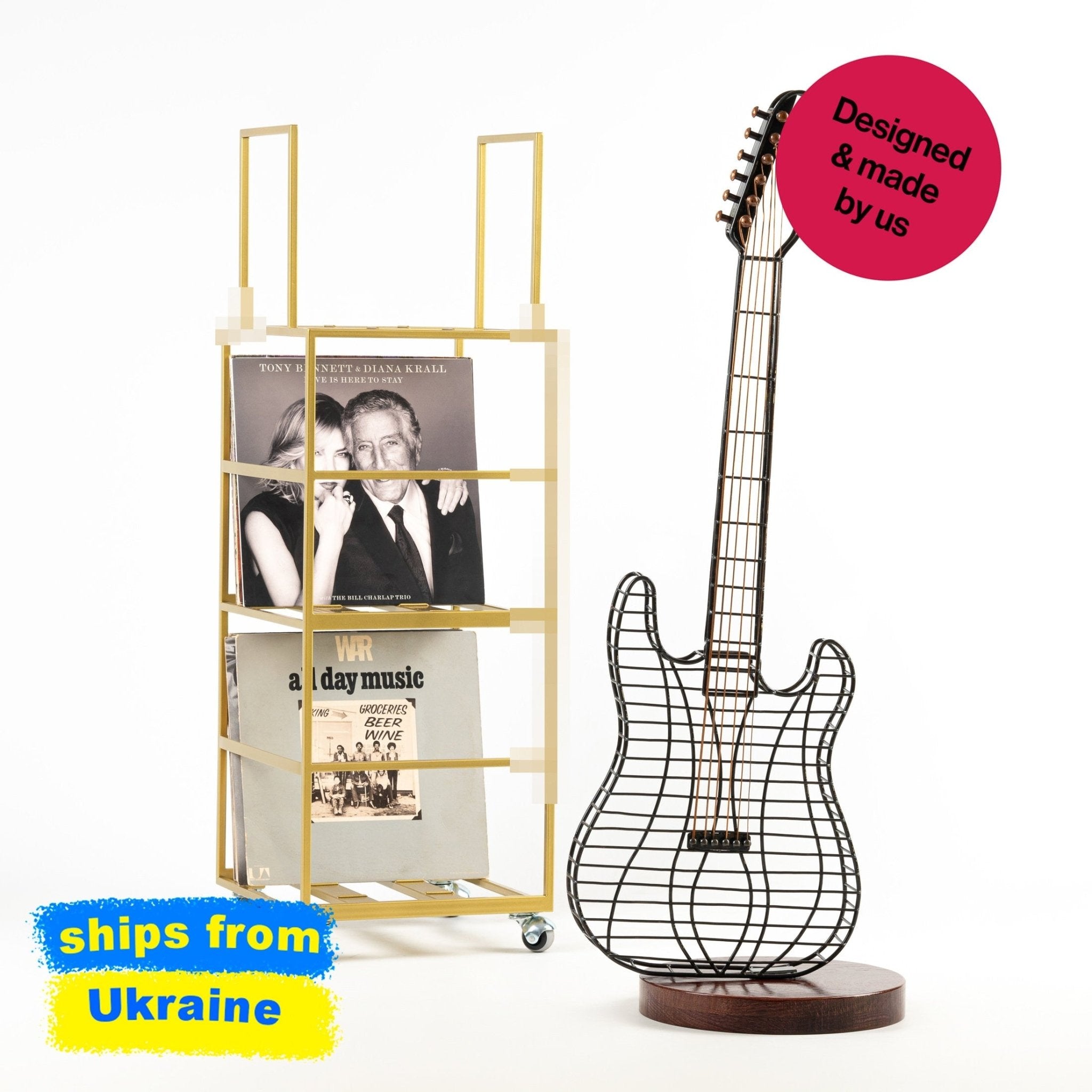 Gold three-tier vinyl record stand on wheels for a large LP collection.