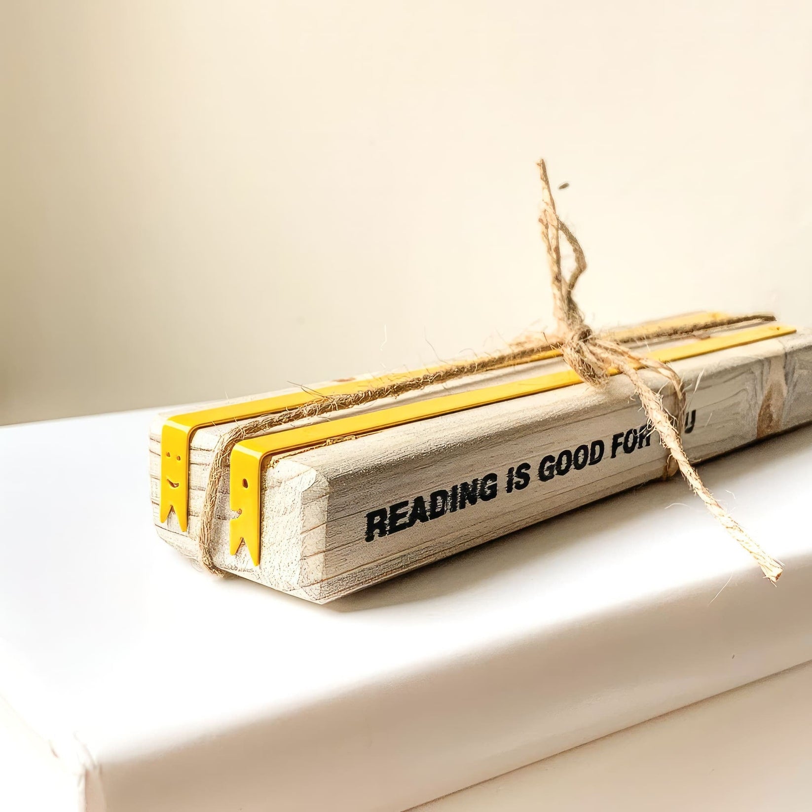 Smiling Ribbons Metal Bookmarks packed with kraft paper and twine as a gift