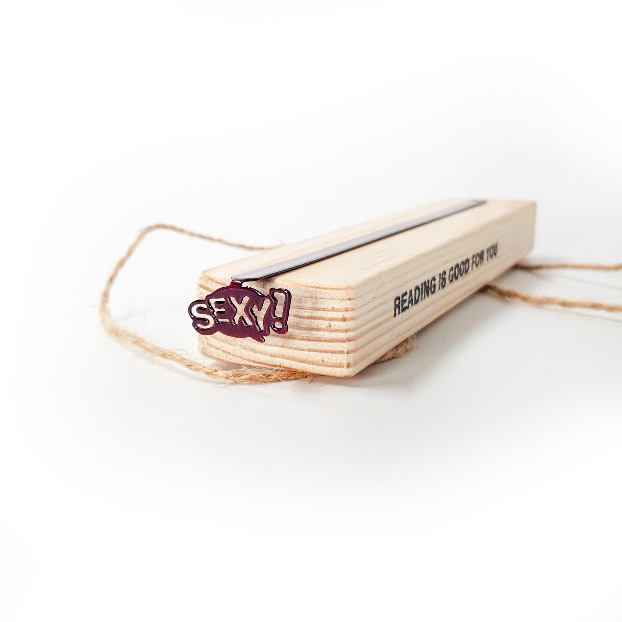 Wooden gift packaging stamped Reading is good for you with the burgundy bookmark