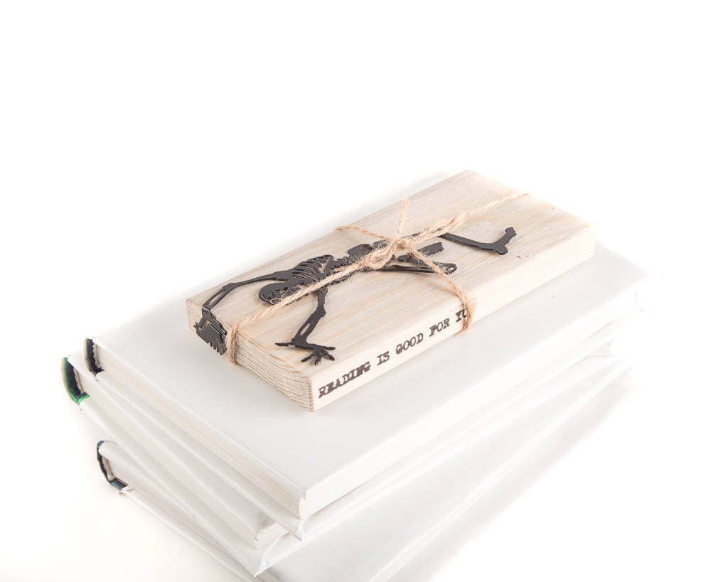 Happy Skeleton metal bookmark with the engraved wooden gift block it ships with