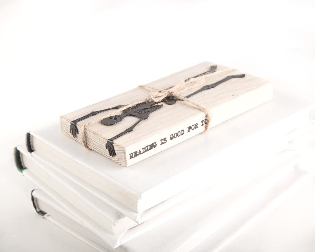 Skeleton in My Book metal bookmark with the engraved wooden gift block it ships with