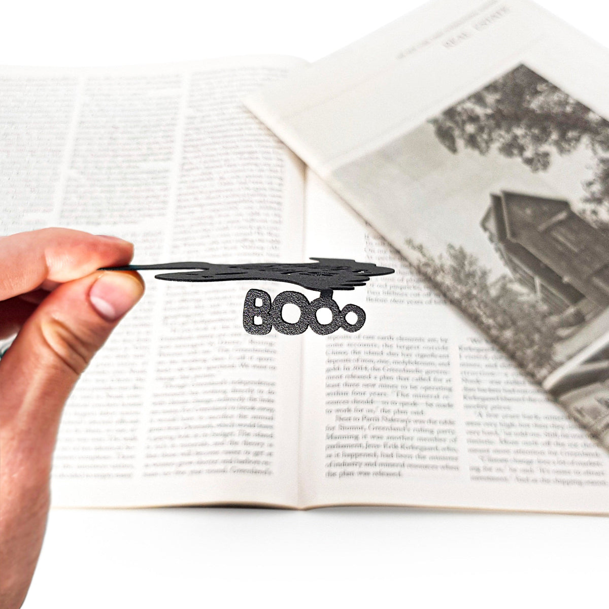Sleep Tight metal bookmark on an illustrated page
