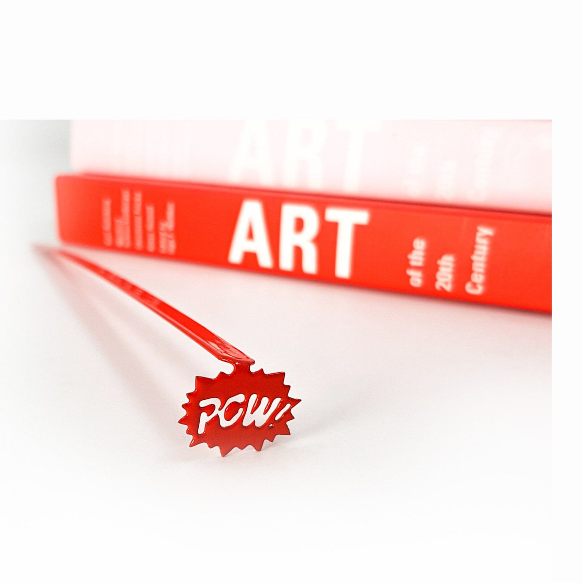 Speech Bubble Pow metal bookmark in red on a coloured background