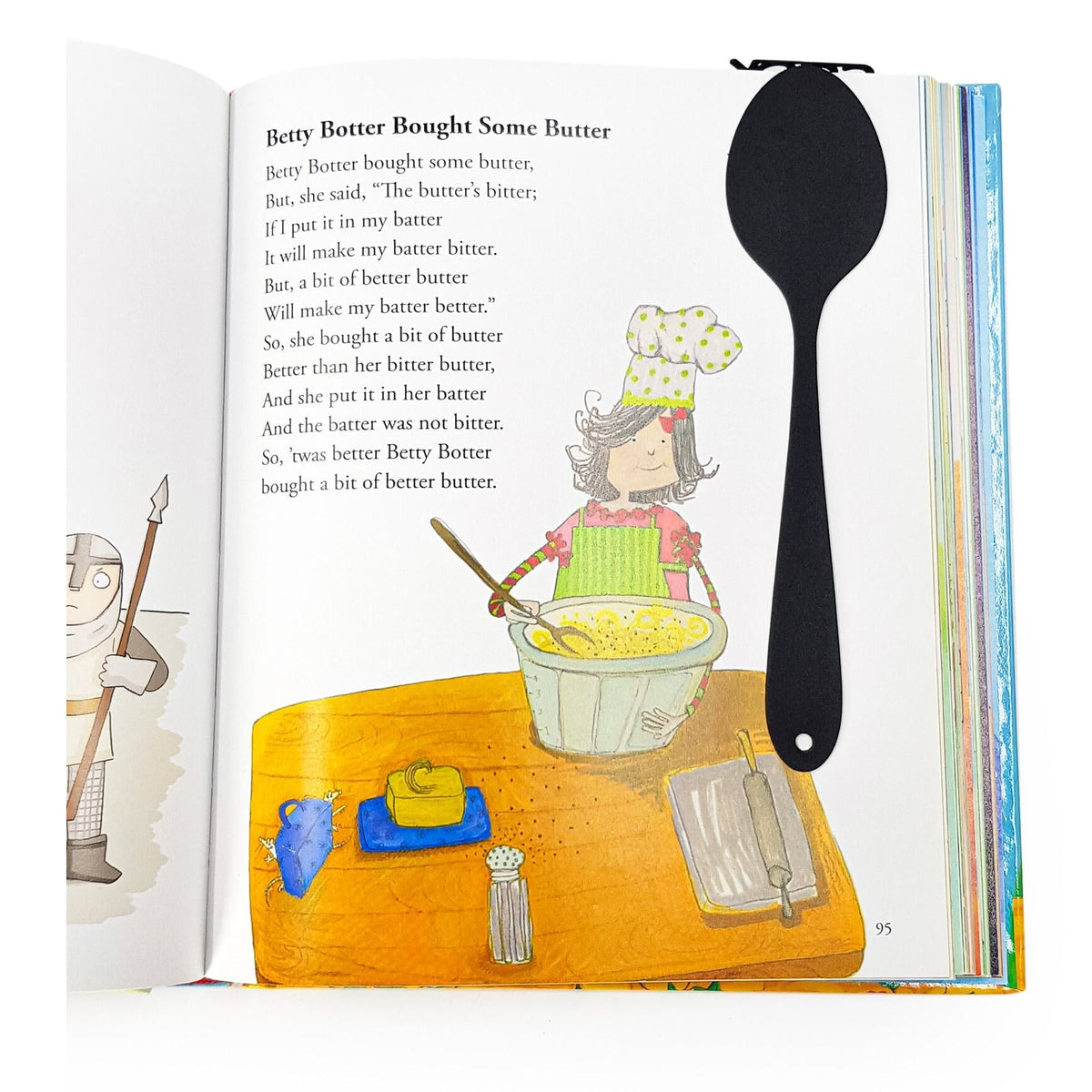 Spoon-Shaped metal bookmark marking a page in an illustrated book