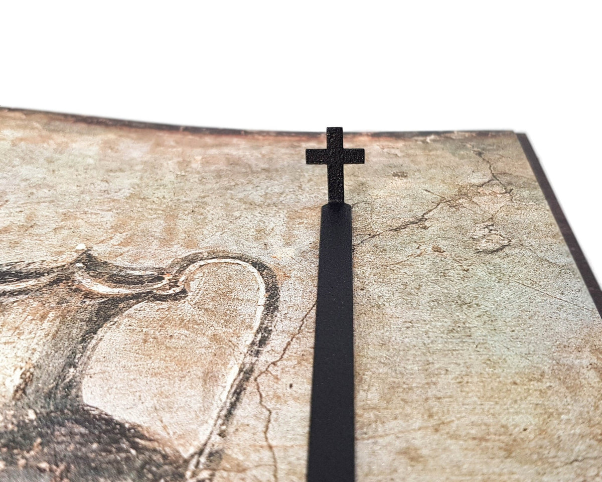Straight Cross metal bookmark on a coloured background, view 4