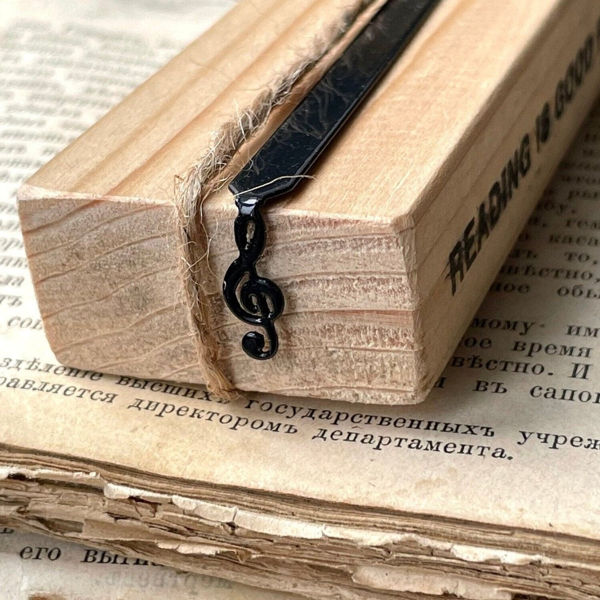 Treble Clef metal bookmark with the engraved wooden gift block it ships with