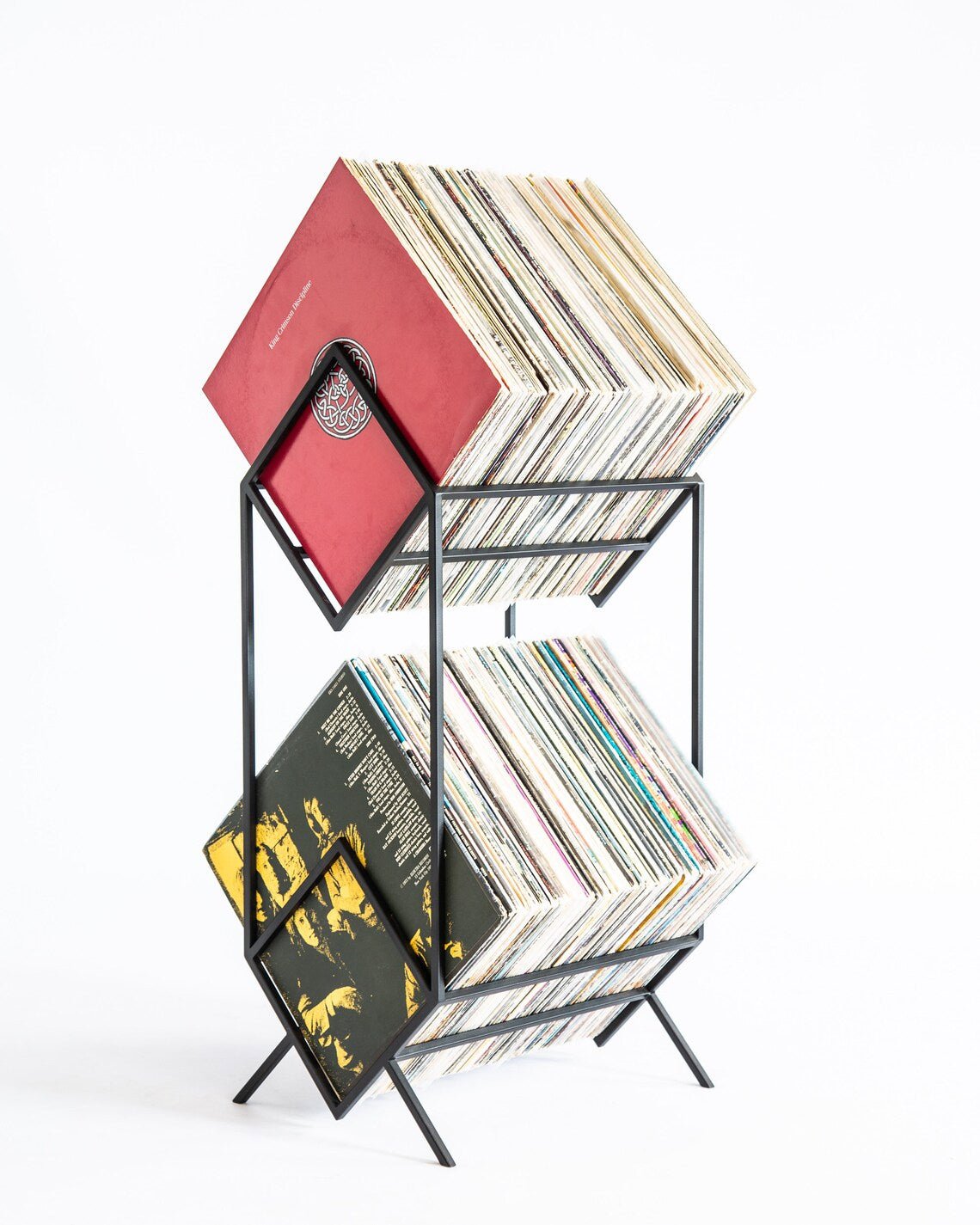 Black Atelier Article 2Romb two-tier vinyl record stand filled with LPs