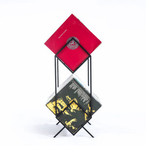 Front view of black Atelier Article 2Romb two-tier vinyl record stand with records