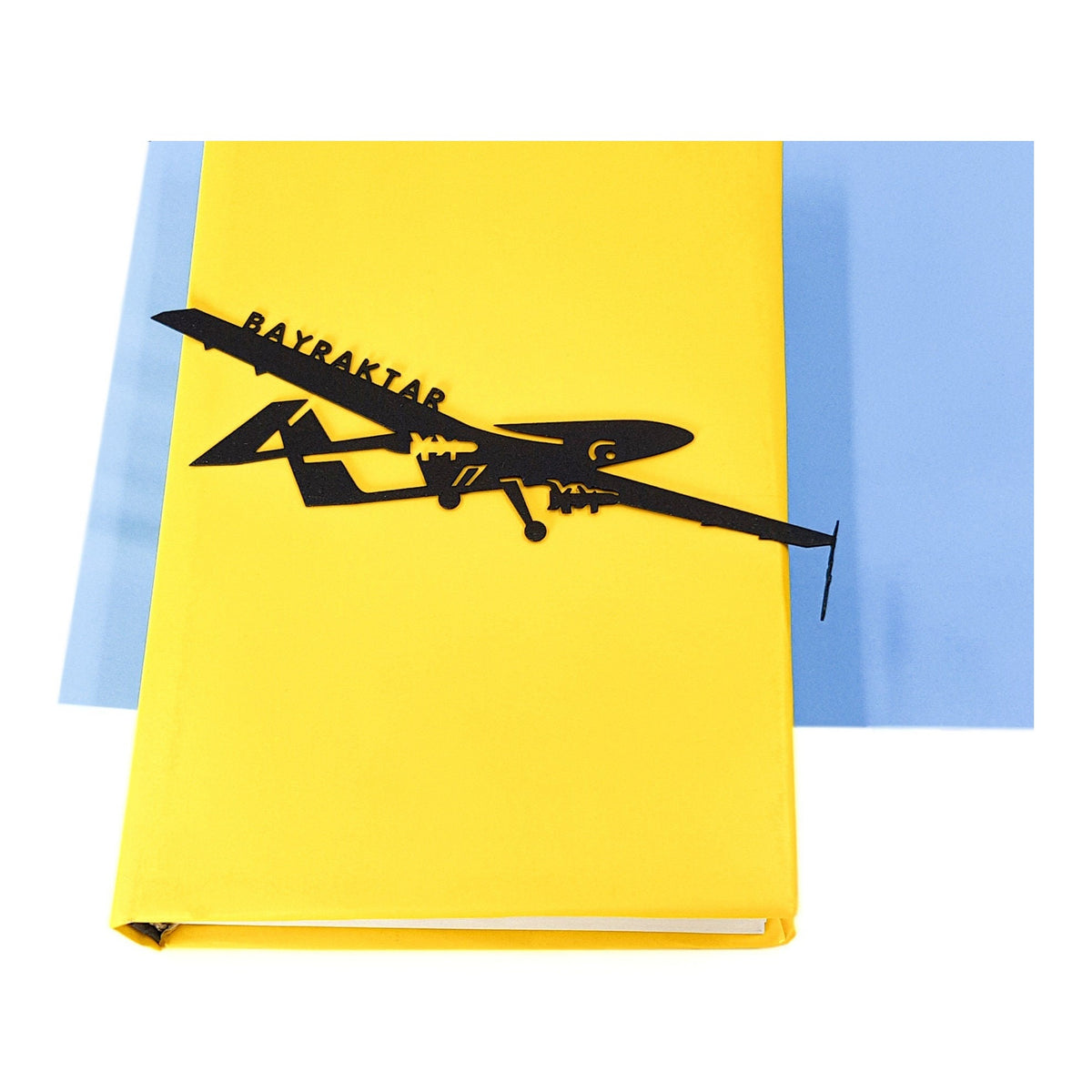 Ukraine Fights Back metal bookmark on a coloured background