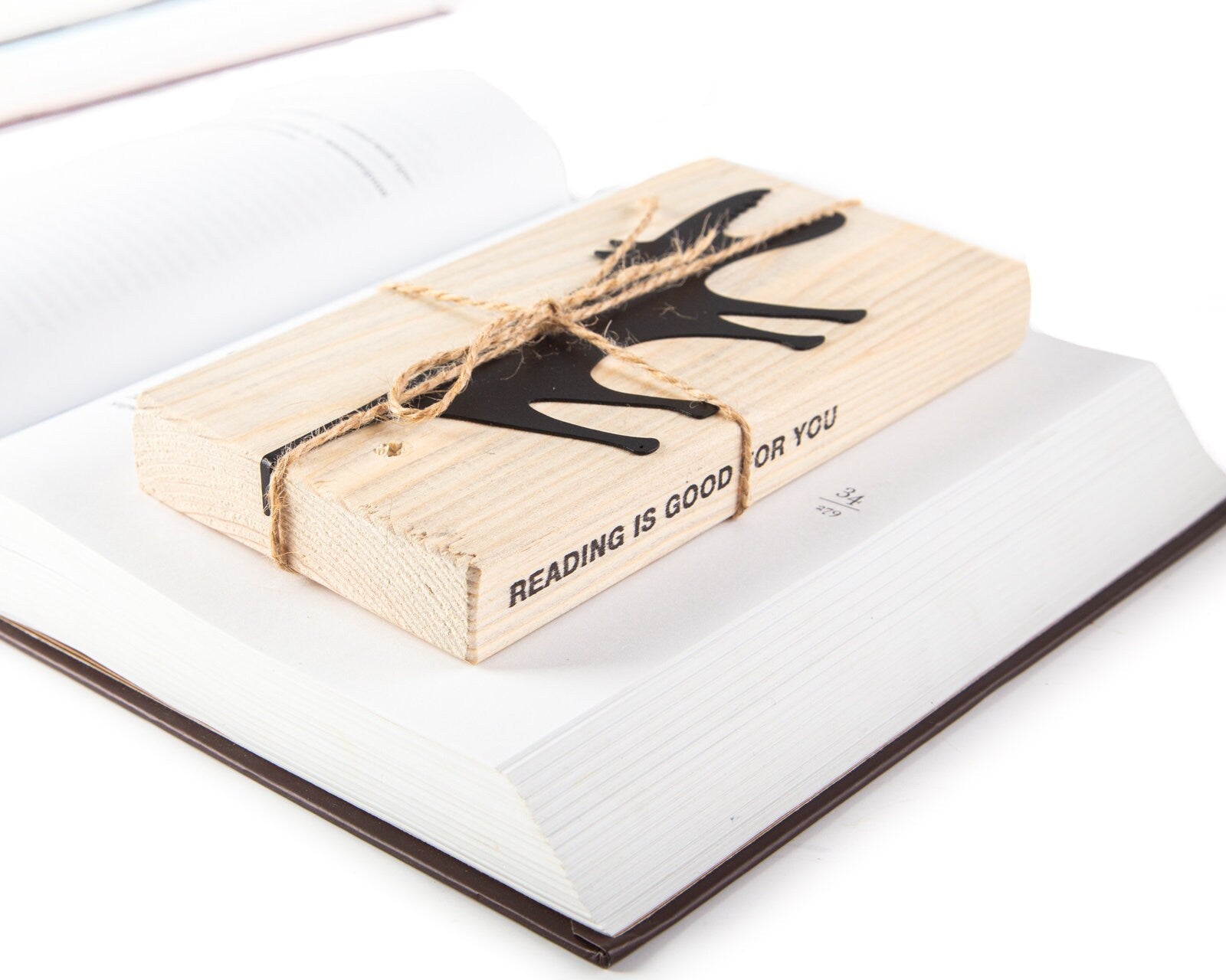 Hungry Wolf metal bookmark with the engraved wooden gift block it ships with