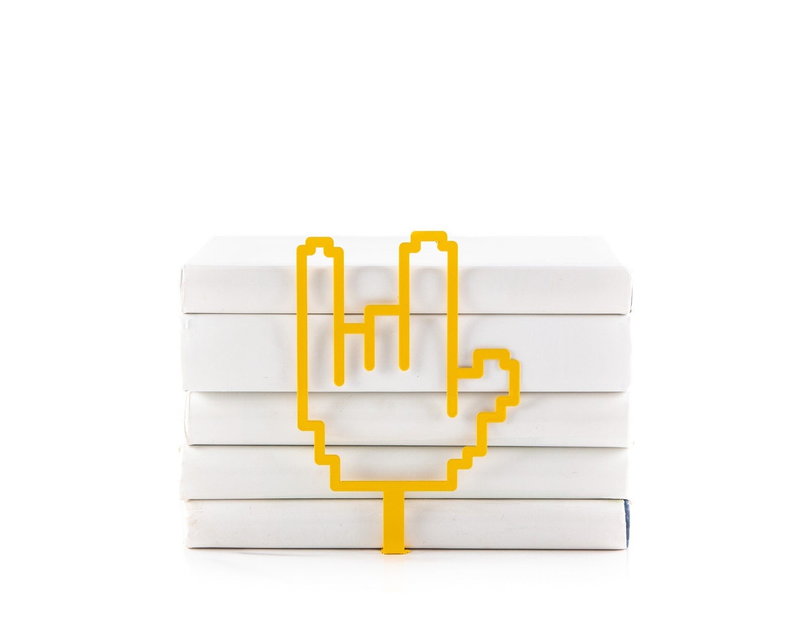 I Love You metal bookmark in gold shown with a stack of books