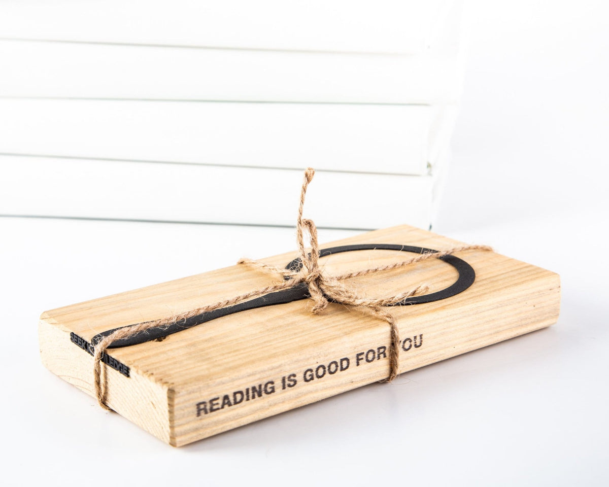 Magnifying Glass metal bookmark packed with kraft paper and twine as a gift