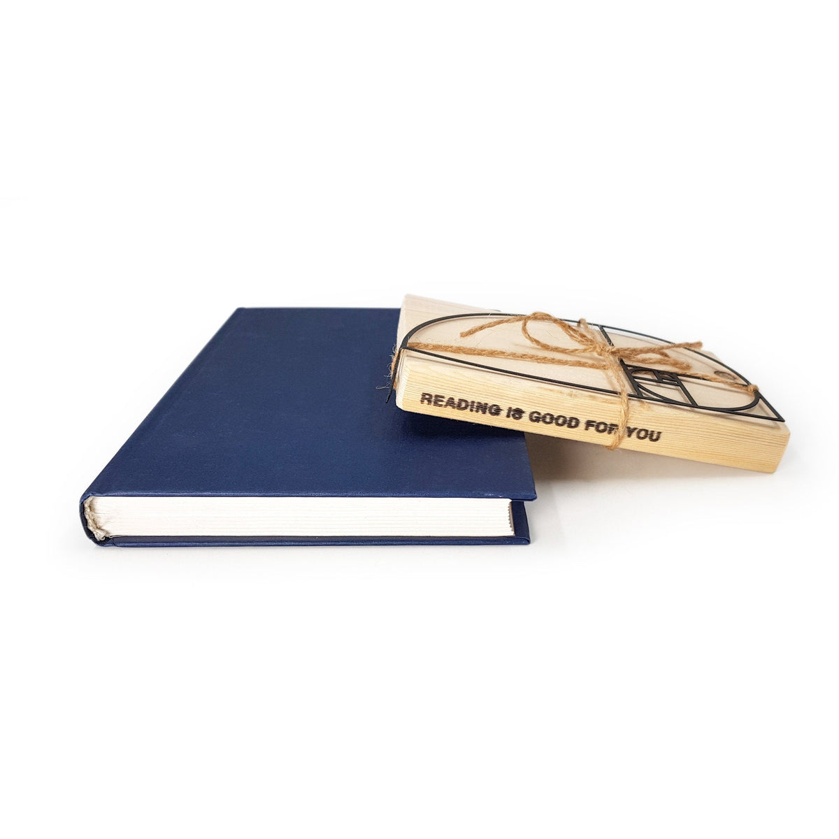Golden Ratio metal bookmark with the engraved wooden gift block it ships with