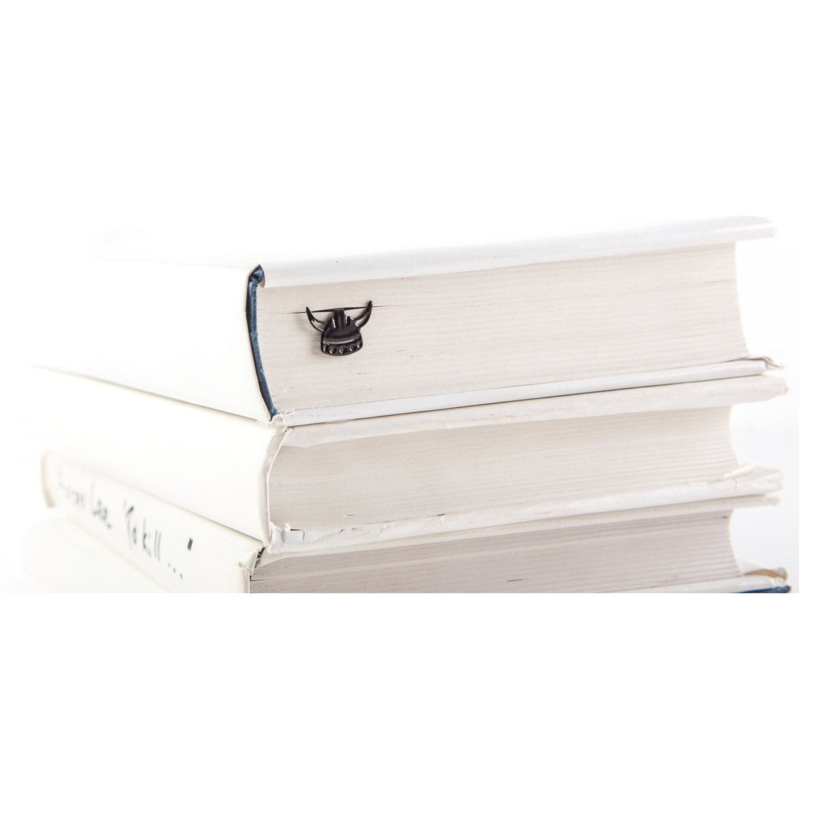 Viking Horned Helmet metal bookmark shown with a stack of books