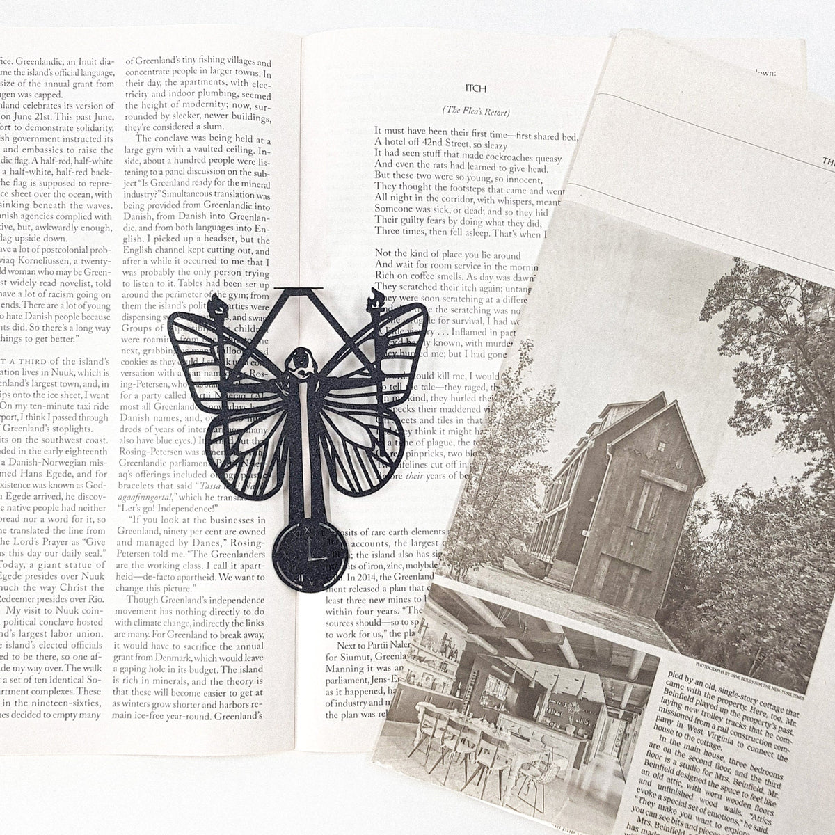 Witch Hour metal bookmark on an illustrated page
