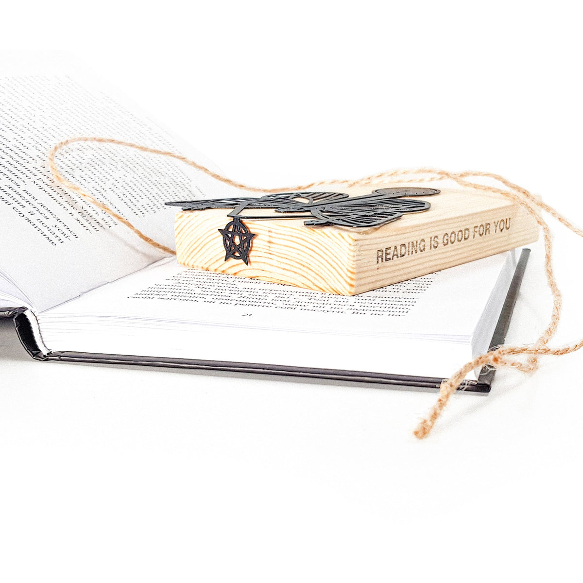 Witch Hour metal bookmark with the engraved wooden gift block it ships with