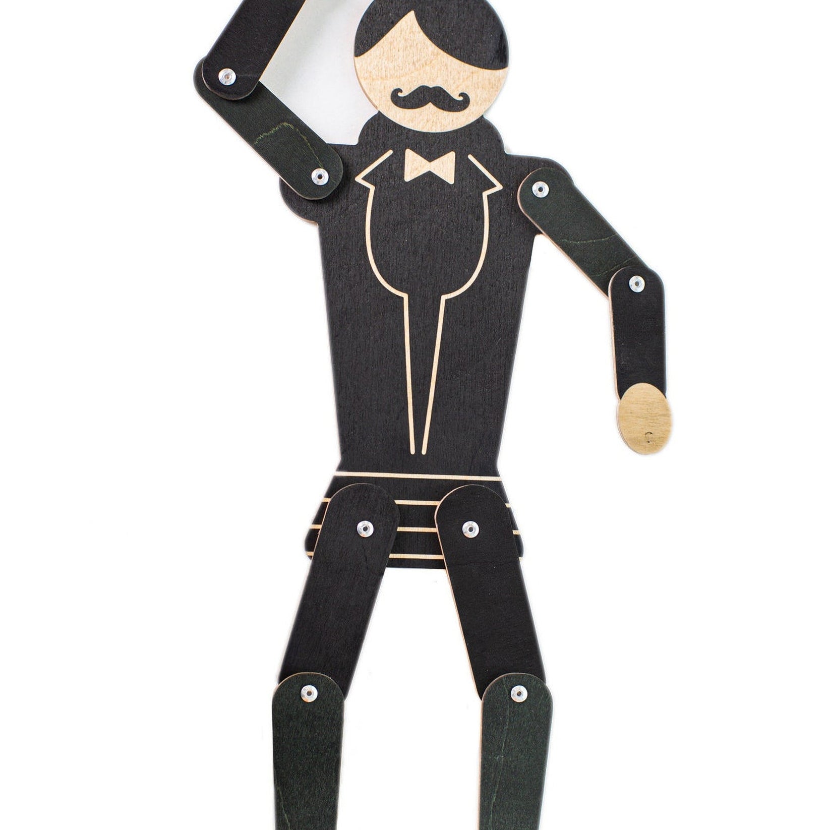 Wooden gentleman puppet in dynamic pose with arm raised, showing hand-poseable joints, black tuxedo and bow tie on white background